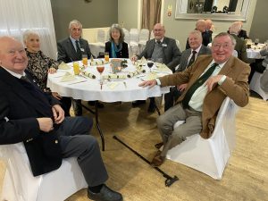 Photo from left: Invited guest Oliver Gibson, Mrs Sheila McLaren, President Sandy McLaren, Border TV Presenter Gilly Fraser, Treasurer Robert Scott, Committee Member Alex Bell, Programme Secretary Ray Chlopas.